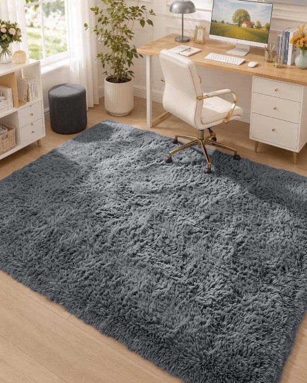 Grey fluffy area rug in a home office
