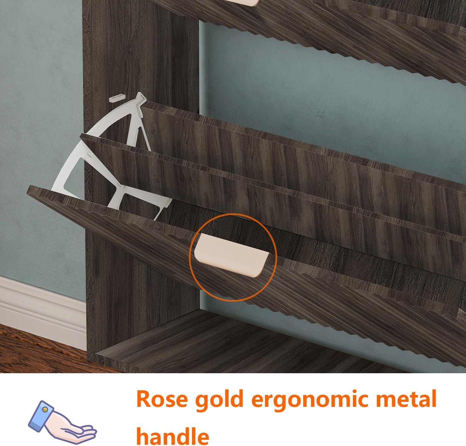 Rose gold ergonomic metal handle on a walnut shoe cabinet drawer