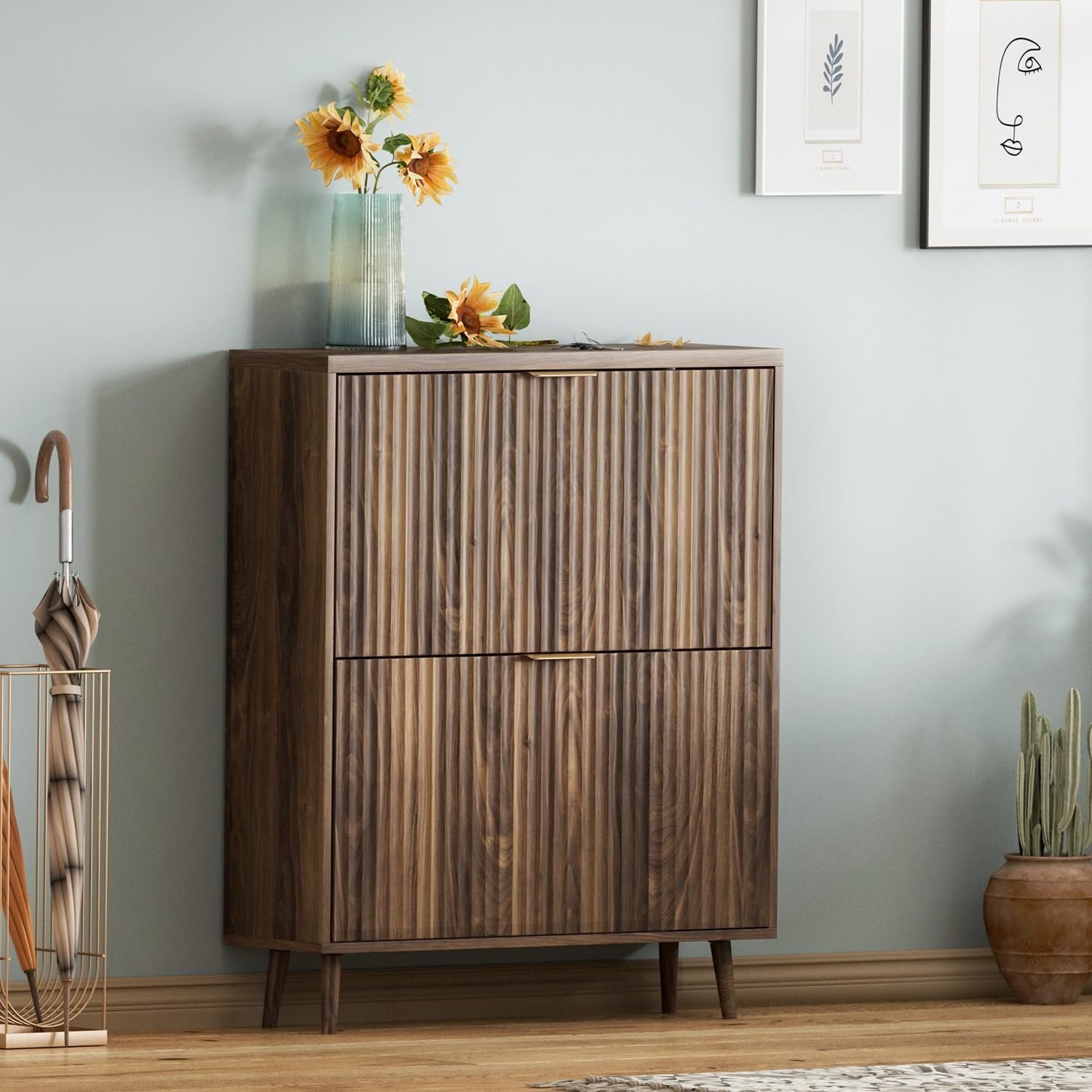 Closed walnut shoe cabinet with fluted doors in an entryway